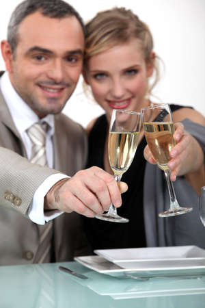Couple toasting with champagneの写真素材