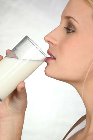 Woman drinking water from glassの写真素材