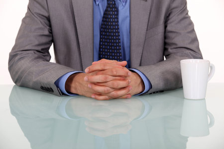 businessman crossing hands