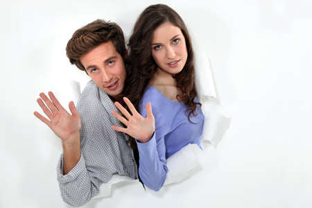 Stepping out of the wall to say hiの写真素材