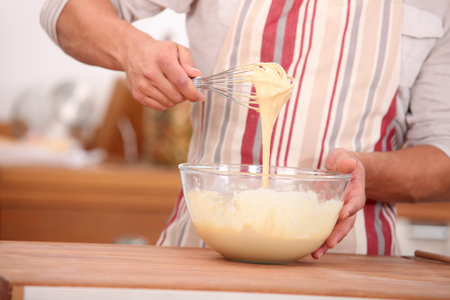 man cooking at home
