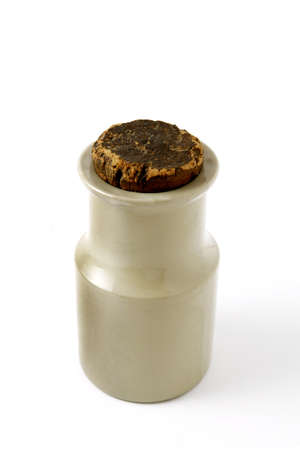 Metal pot with a cork lidの写真素材