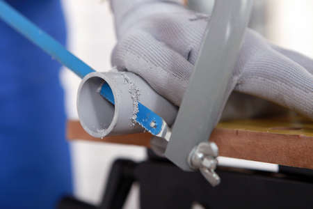 Worker cutting pipeの写真素材