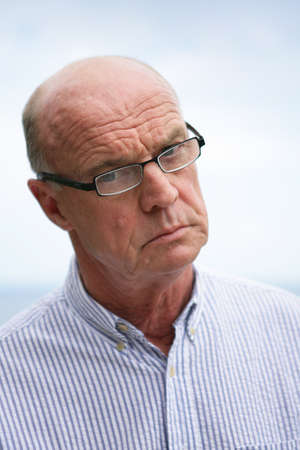 old man having troubleの写真素材