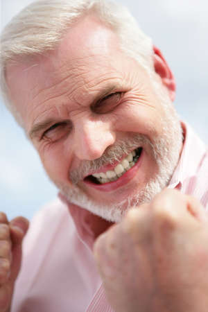 Triumphant senior manの写真素材