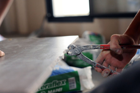 Man using tile cutting toolの写真素材
