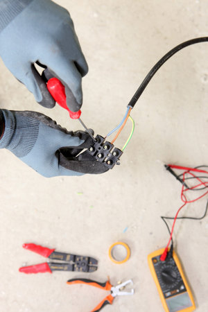 Electrician wiring a house