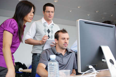 Colleagues working together on a projectの写真素材
