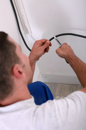 Electrician clipping a wire