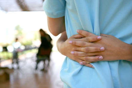 Couple hugging outdoorsの写真素材