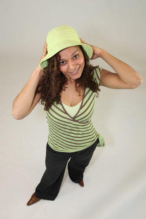 High-angle shot of a woman wearing a wide-brimmed hat