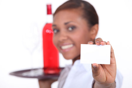 Waitress with a bottleの写真素材