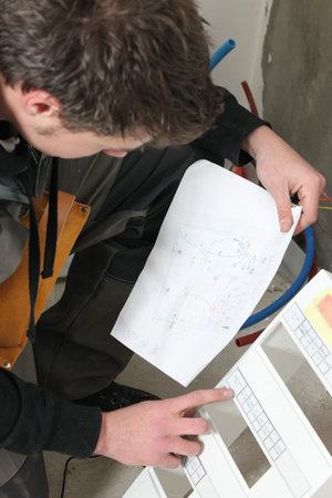 Electrician with a fusebox