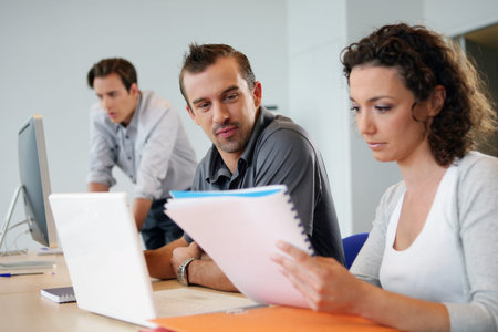 Young people at work in a office