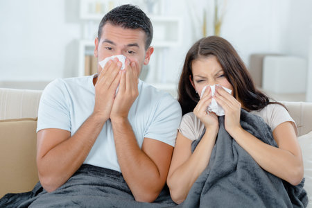 Couple sick on the sofa