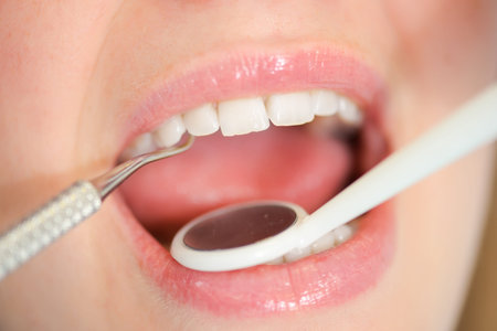 Dentist looking into a woman's mouth