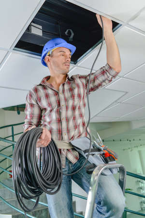 Builder with cable rollの写真素材