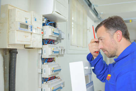 Electrician on a jobの写真素材