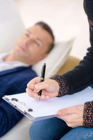 Man talking to his therapistの写真素材