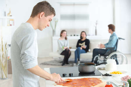 Cooking for a disabled friendの写真素材