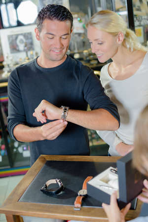 Picking out a watchの写真素材