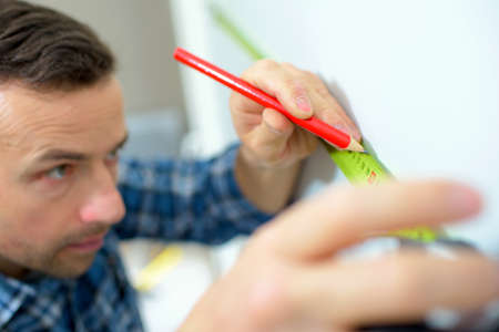 Tape measure to mark out a lineの写真素材