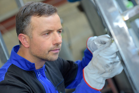man with metal frame