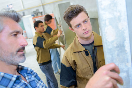 Apprentices learning a trade