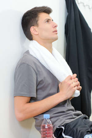 young man with a sports towelの写真素材