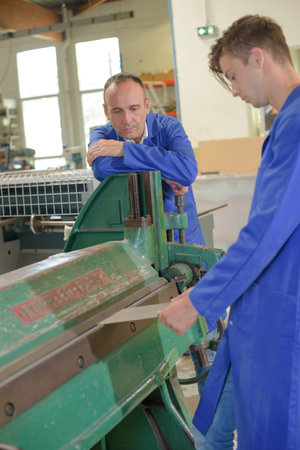 young man with a stationary machine