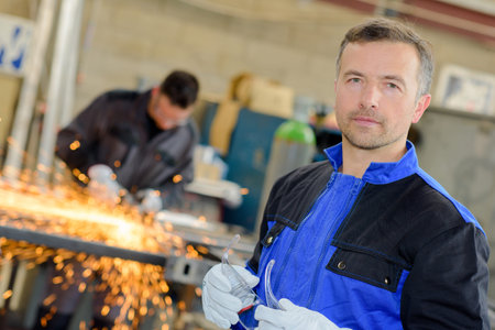 man in the welding shop