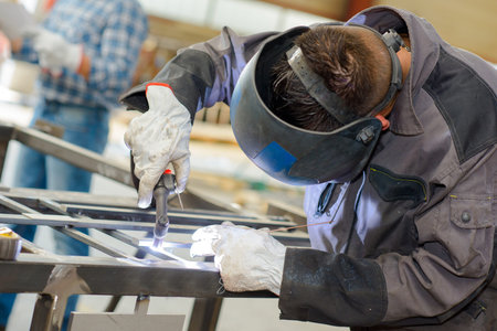 Man welding metal