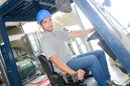Man driving fork lift