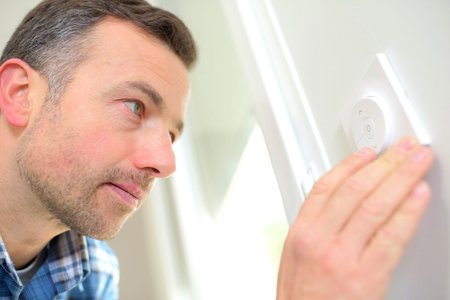 Electrician fitting an outlet