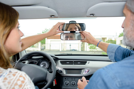 adjusting the rear-view mirrors