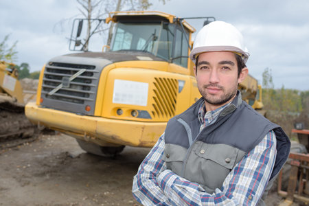 Portrait of man on building site
