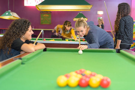 Lady breaking at pool