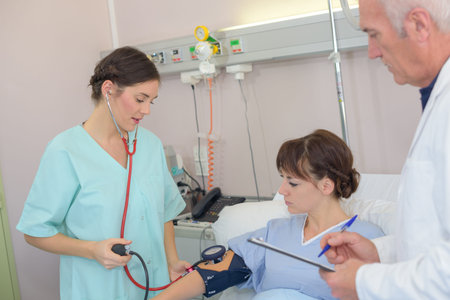 checking the blood pressure