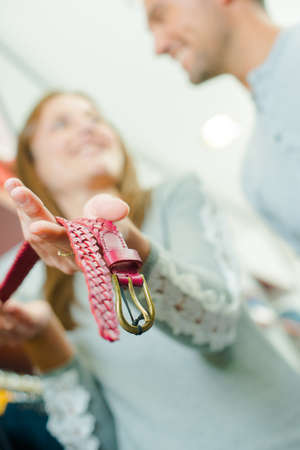 Lady holding beltの写真素材