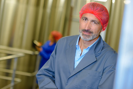 worker leaning and posingの写真素材