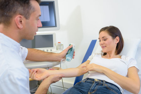 applying gel on the wristの写真素材