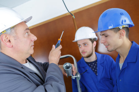 manager of team builders showing how to work indoors