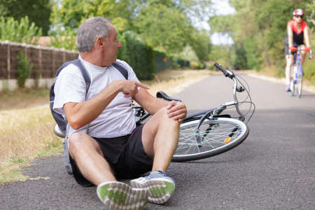 accident older man cyclingの写真素材