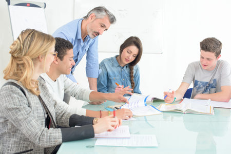manager and stuff meeting in an office
