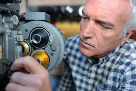 worker on machineの写真素材