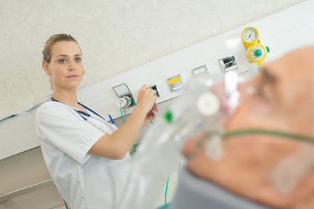 doctor using a machine on a patient