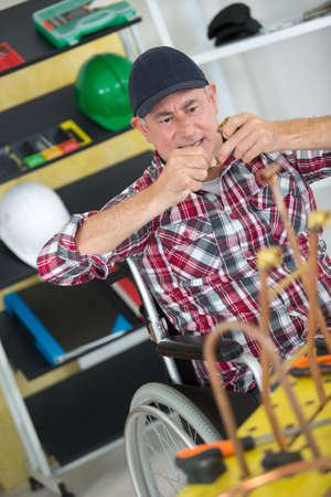 disabled worker in wheelchairの写真素材