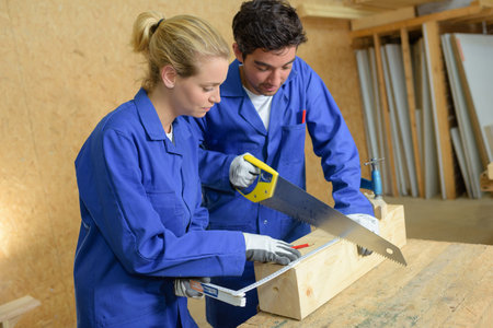 workers in carpentry workshop