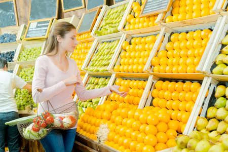 girl and orangeの写真素材