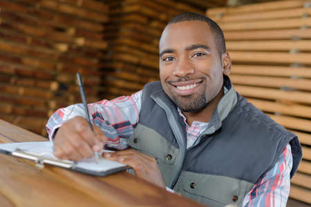worker preparing the invoiceの写真素材